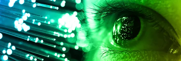 Close up of human eye with glowing fiber optics